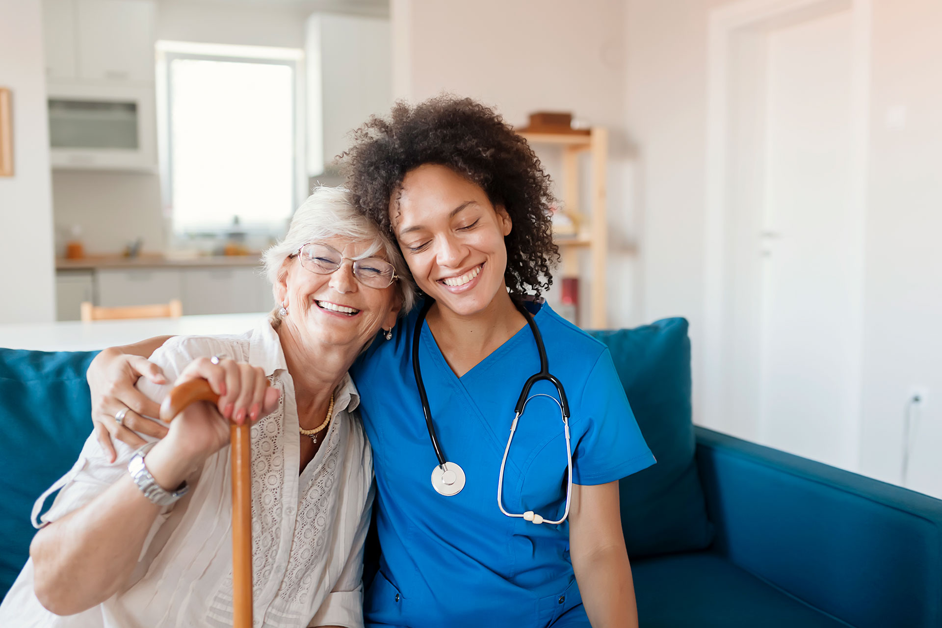 The Oaks at Bartlett | Senior woman smiling with medical professional