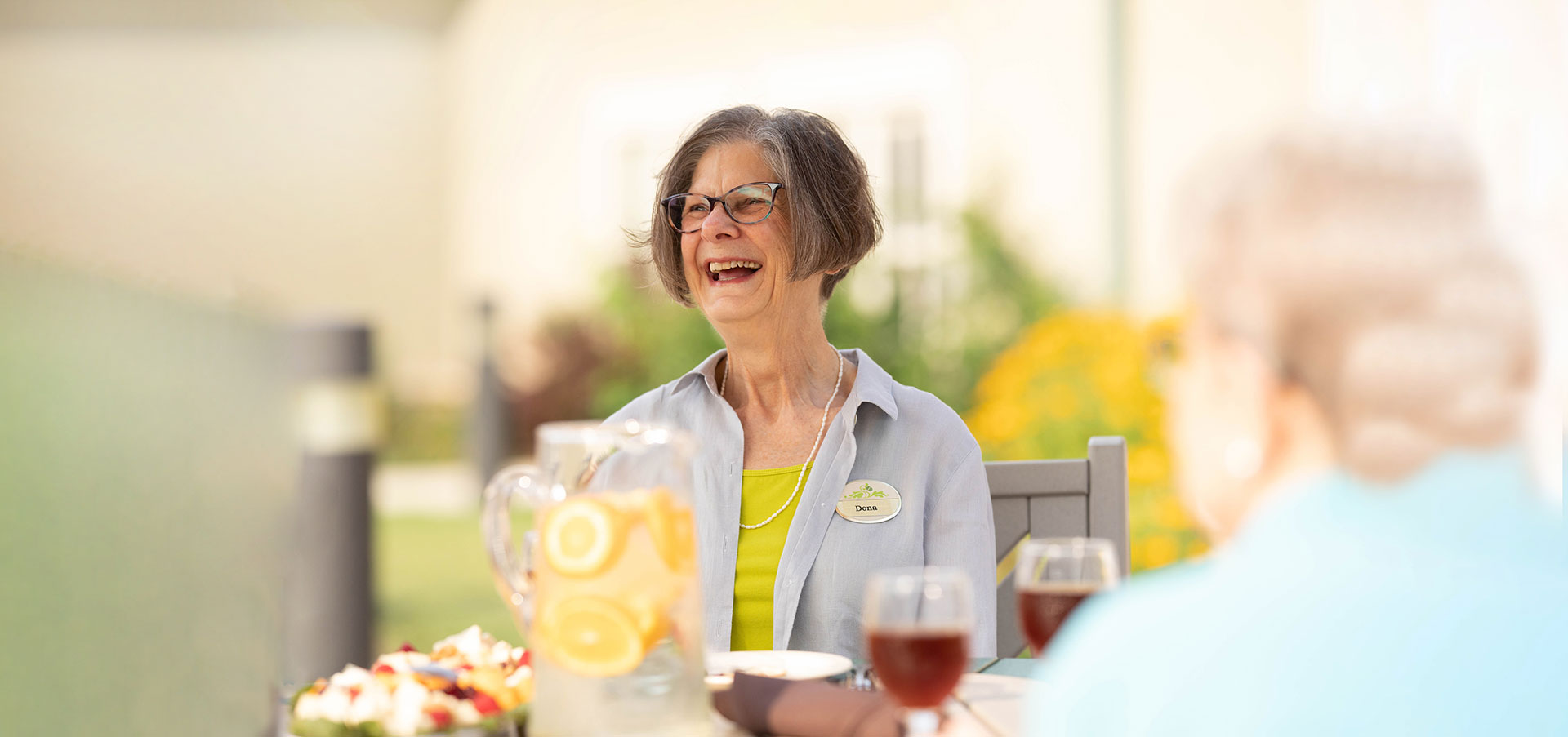 The Oaks at Bartlett | Happy senior women laughing while socializing